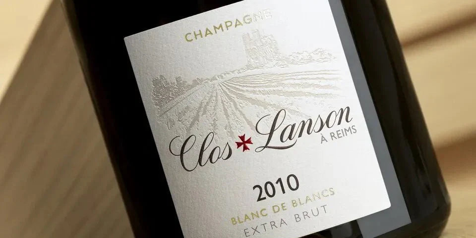 Close-up of Clos Lanson 2010 Champagne label, Blanc de Blancs Extra Brut bottle