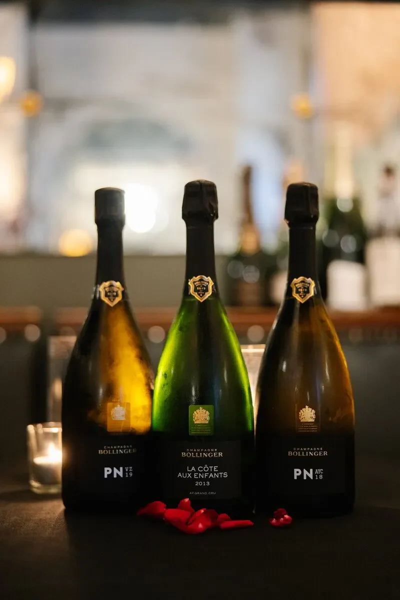 Three Bollinger Champagne bottles (PN VZ19, La Côte aux Enfants 2013, PN AYC18) set for a Sydney caviar dinner in October