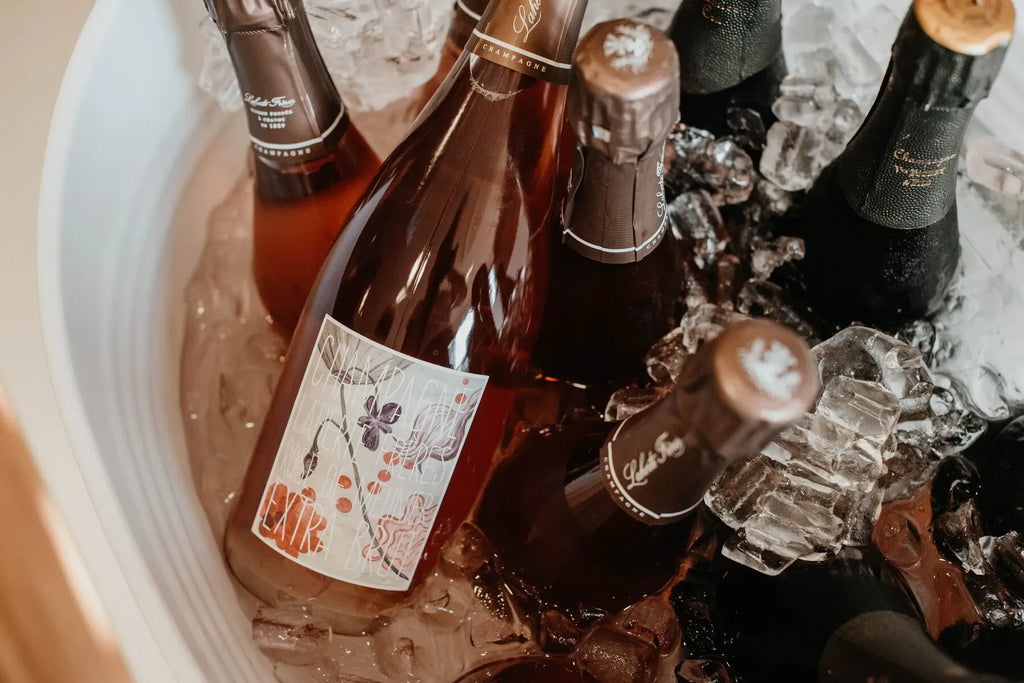 Champagne bottles in ice bucket, chilled sparkling wine for celebration or event