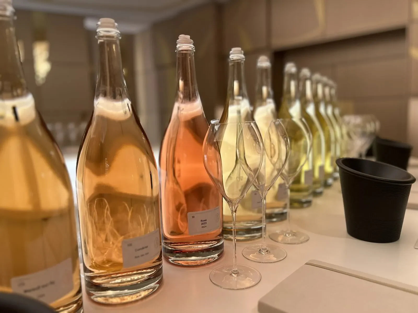 Champagne tasting line-up at Le Printemps des Champagnes, France. Rosé and blanc de blancs selections. April 2024.